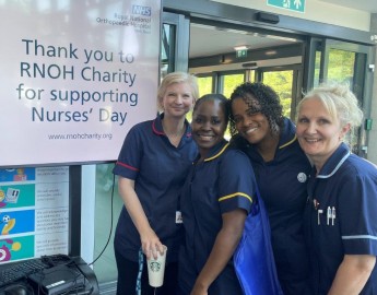 Nurses with RNOH Charity thank you sign