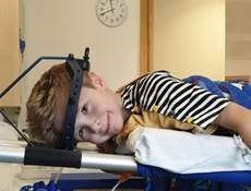 Boy in halo traction